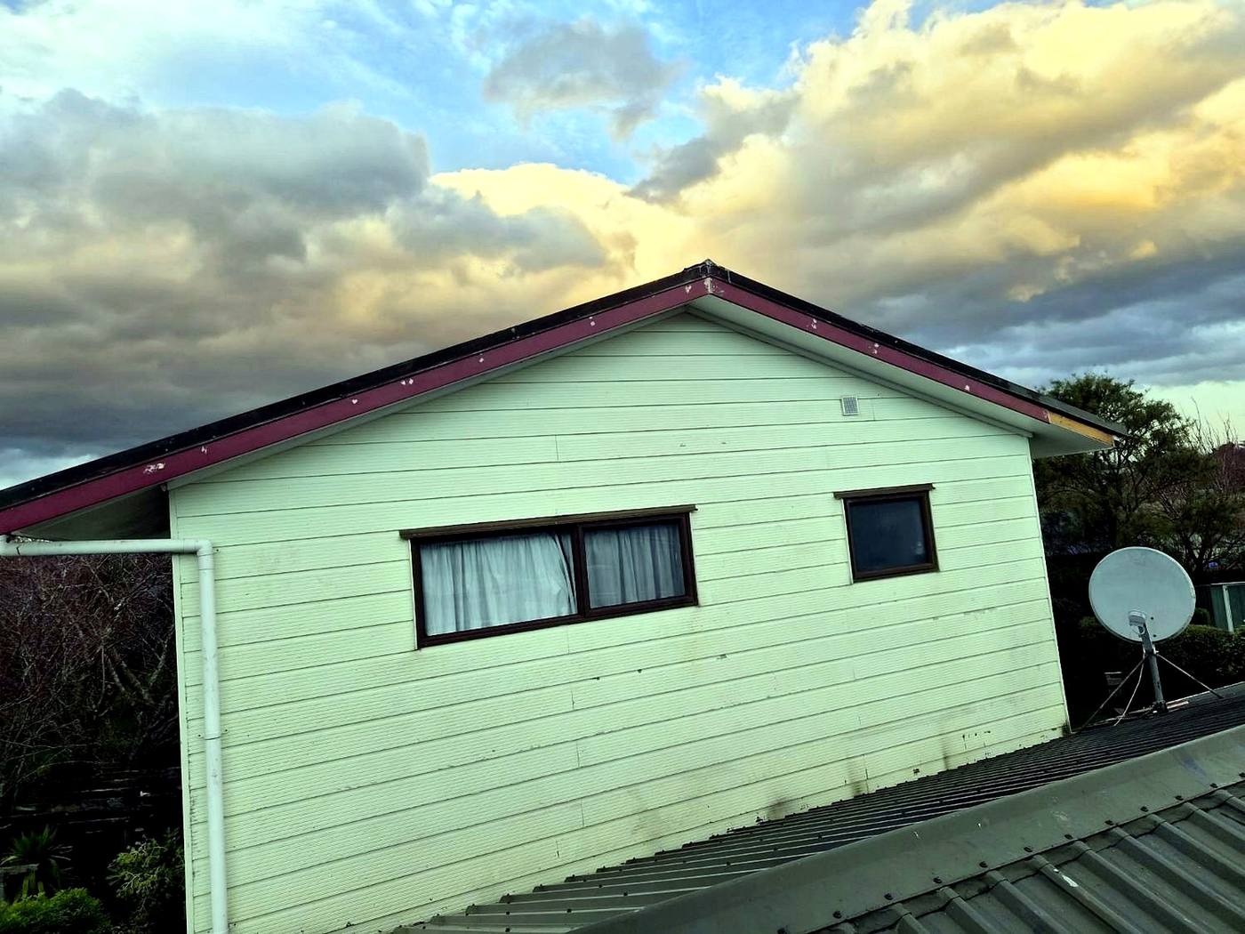 Cream gable end with fresh paint